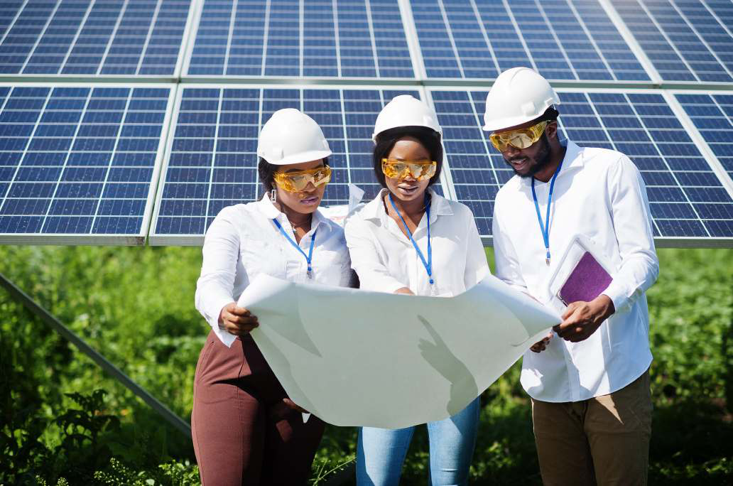 Renewable energy professionals reviewing plans